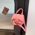 Pink quilted felt mini handbag with crossbody strap and gold metal buckles for women - Pink