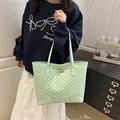 Chic mint green tote bag with 'M' pattern print and gold logo for daily commuting - Green