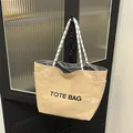 Borsa tote in tela beige con stampa TOTE BAG e manici in corda bianchi e neri - Cachi