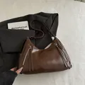 Deep brown soft leather tote bag with stylish silver zippers and elegant curved shape - No Pendant / Brown