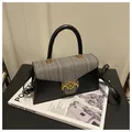 Fashion contrast crossbody bag in black matte leather and grey tweed with M gold buckle - Black