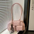 Pink matte leather Boston bag with double front pockets and tennis racket pendant decor - Pink With Pendant