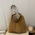 Brown frosted suede tote bag with long strap and cute plush dog charm accessory - Brown with Pendant