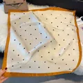 Detail of silk-like square scarf featuring black polka dots and mustard yellow borders - Ginger Border Black Polka Dot Style (SJ2606—3)