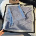 Detailed view of large paisley silk scarf in blue-grey with wide black border and smooth finish - Grey Blue Paisley Style (SJ2606—4)