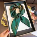 Deep green geometric plaid silk scarf for women elegantly displayed with fashion accessories - 70cmx70cm / Green