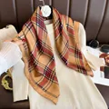 Detail of green and red plaid square silk scarf styled with beige knit sweater - 70cmx70cm / Khaki