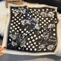 Macro detail of a 70cm satin silk scarf with black polka dots and white floral patterns - Black And White Polka Dot Floral Style (SJ2606—2)