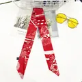 Vibrant red silk scarf with white geometric patterns for bags and hair styling - Leopard Red