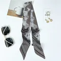 Detail of zebra pattern satin scarf with smooth silk texture and diagonal cut ends - 100x6cm / Charcoal Grey