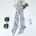 Bohemian paisley silk ribbon scarf with floral print and pointed ends for fashion styling - 100x6cm / White