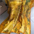 Elegant gold silk scarf with traditional landscape print and soft draped texture - Artistic Landscape Scroll Yellow Green