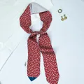 Elegant red and white geometric silk scarf ribbon tied in a bow with golden jewelry - Color 5 (Bright Red Vintage Floral)