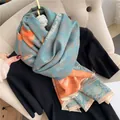 Close-up of double-sided jacquard scarf with retro floral pattern and fringe tassels - Light Blue