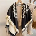 Classic black and white striped wool scarf with fine fringe on beige coat - Black Beige