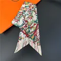 Detail of multi-color abstract pattern silk twilly scarf with elegant satin finish - Pattern 3 (Red Green Abstract Lines)