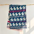 Detail of cashmere-like scarf with blue cactus print and ethnic border on wood branch - 185x65cm / Blue