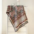 Ethno-Strickschal mit Alpakas und geometrischen Mustern in Blau, Braun und Cremeweiß - 190x65cm / Kaffeebraun