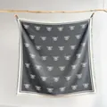 Detail of bee pattern square scarf with tassels hanging on a wooden branch - Large Square Scarf / Gray