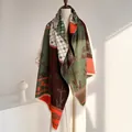 Detail of vintage ethnic cashmere-feel scarf with bamboo patterns and fringe edges - Dark Green Brown Orange Red Contrast