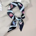 Elegant printed twilly silk scarf with vibrant patterns tied on a beige blazer collar - 100*5cm / Black