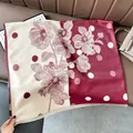 Detailed texture of beige and burgundy floral pashmina scarf with fine fringe edges - Color Block Polka Dot Red