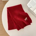 Detailed close-up of cute dog embroidery on a soft burgundy knitted mohair scarf - 160x27cm / Red