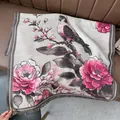 Close-up of floral bird pattern weaving with fringe details on a warm ethnic shawl - Bird Peony Gray
