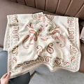 Detail of winter paisley scarf with fringe edges and vintage thick cashmere-like texture - Beige and Green