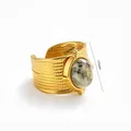 Macro shot of 18K gold plated wide band ring featuring oval gemstone and 14mm detail - US7 / Creamy White Gemstone Style (TR25137D1W7)