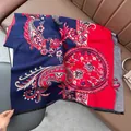 Detail of red and navy blue paisley wool shawl with soft texture and elegant black fringes - Patchwork Paisley - Blue Red
