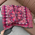 Close-up of ethnic style shawl featuring red mandala patterns and fringe detail - Lucky Pattern - Blue Red