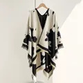 Soft faux cashmere shawl wrap featuring black and white cow print and elegant fringe - One Size / Black