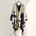 Soft faux cashmere navy blue abstract cow print poncho with elegant fringe hem - One Size / Blue