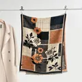 Detail view of floral patchwork scarf with tassels and thick cashmere-like warm texture - Black Orange