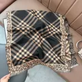 Detail of leopard print and geometric plaid scarf with delicate fringed edges - 180x65cm / Black Coffee