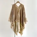 Beige cashmere-like ginkgo leaf knit shawl cape with fringe detail on hanger - 150x130cm / Khaki