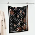Close-up of black and brown paisley jacquard shawl with tassel fringe details - 185x65cm / Black