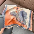 Floral cashmere-like scarf with ink lotus patterns and delicate tassels on a leather background - 180x65cm / Blue and Orange