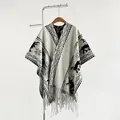 Detail of vintage knit poncho with reindeer motifs and long tassels on white background - Gray / 170x110cm (large Size)