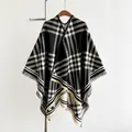 Elegant black and white houndstooth cashmere-like knit poncho with decorative tassels - Black / 150x130cm