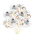 Close-up of clear latex balloons with Happy Birthday print and colorful paper confetti - 12 Inch / Crown Theme + Colorful Confetti