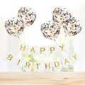 Close-up of gold Happy Birthday banner and confetti-filled clear party balloons - White Gilded Banner + 5 Colorful Sequin Balloons