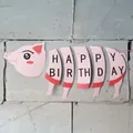 Pink cartoon pig Happy Birthday banner hanging on wall for party decoration - Pig