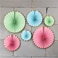 Close-up of pastel paper fans with gold wave edges for party wall decoration - Large Green Mixed With Gold Edge