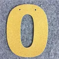 Détail de la bannière dorée pailletée chiffre zéro avec trous pour décoration de fête - Chiffre 0 / Or