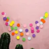 Colorful felt circle garland featuring bright multi-color paper banner for party decor - Rainbow Circle Garland