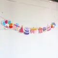 Colorful cartoon bunting banner for baby first birthday party with cake and crown icons - Pink First Birthday Theme (Crown Party)