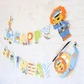 Detail of Happy Birthday banner with cartoon lion police and transport vehicles on brick wall - Police Car Theme