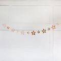Guirlande d'étoiles rose doré avec pentagrammes creux pour décoration de fête - Étoiles à cinq branches évidées or rose